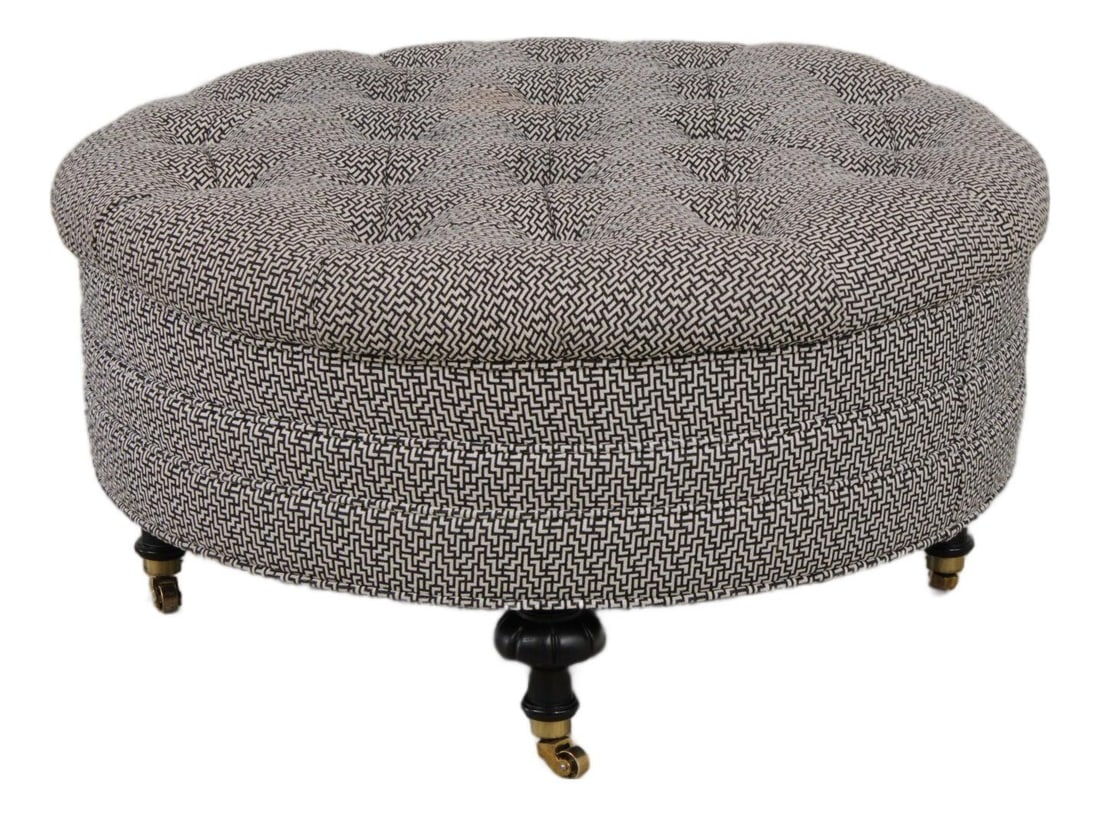 Black Geometric Tufted Ottoman With Brass Capped Casters Modern Style: Black Geometric Tufted Ottoman With Brass Capped Casters Modern Style This round cocktail ottoman features a modern design with deep button tufting and a striking geometric pattern. Crafted with high 