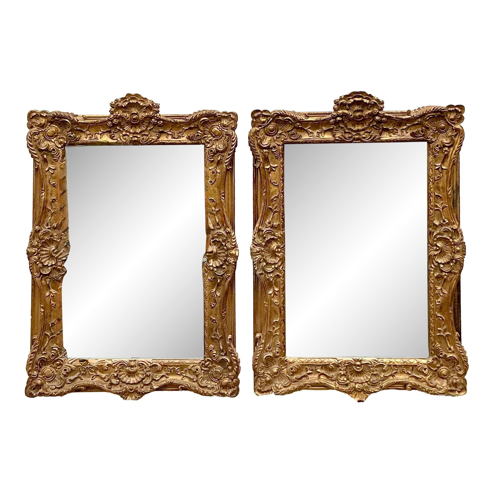 Pair of Vintage Regency Gilt Mirrors with Ornate Frames: Pair of Vintage Regency Gilt Mirrors with Ornate Frames Enhance your interior with this exquisite pair of vintage Regency-style gilt mirrors. Each mirror features an ornately carved wooden frame adorn