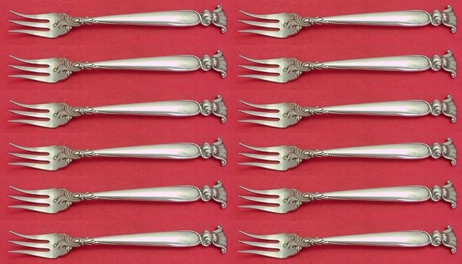 Wallace Romance of the Sea Sterling Silver Fork Set 12 Pieces: Wallace Romance of the Sea Sterling Silver Fork Set 12 Pieces Elevate your dining experience with this exquisite 12-piece cocktail fork set from Wallace, featuring the elegant Romance of the Sea patte