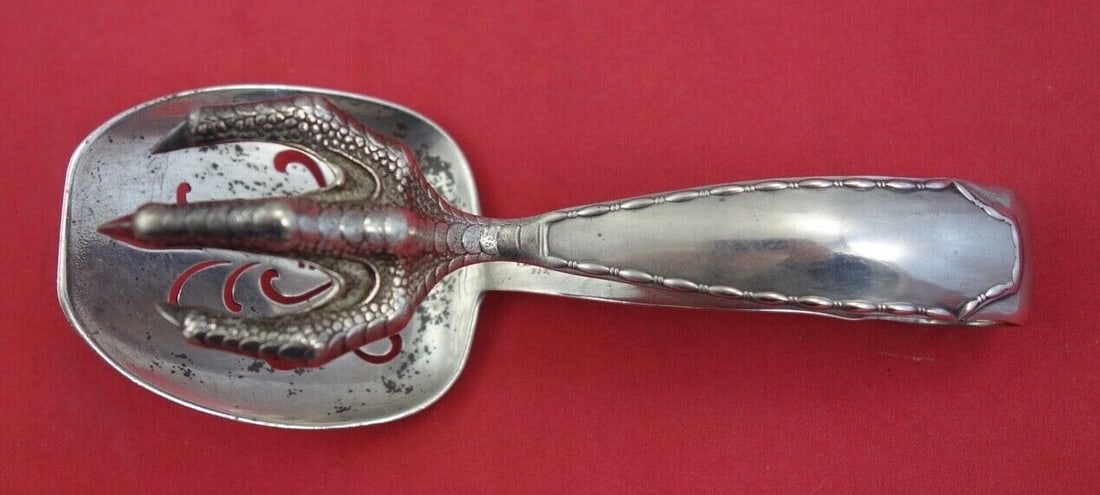 Tiffany & Co Marquise Sterling Silver Ice Tong Claw 5 3/4": Tiffany & Co Marquise Sterling Silver Ice Tong Claw 5 3/4" This exquisite Marquise ice tong by Tiffany & Co. showcases a classic design in sterling silver. Crafted between 1900 and 1940, this piece fe