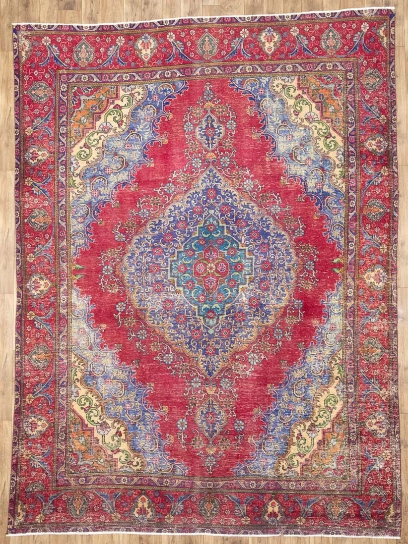 Hand Knotted Wool Floral Vintage Area Rug 9'6x12'9: Hand Knotted Wool Floral Vintage Area Rug 9'6x12'9 This semi-antique handmade Oriental rug features a beautiful muted floral pattern crafted from wool. The rug is hand-knotted, showcasing traditional 