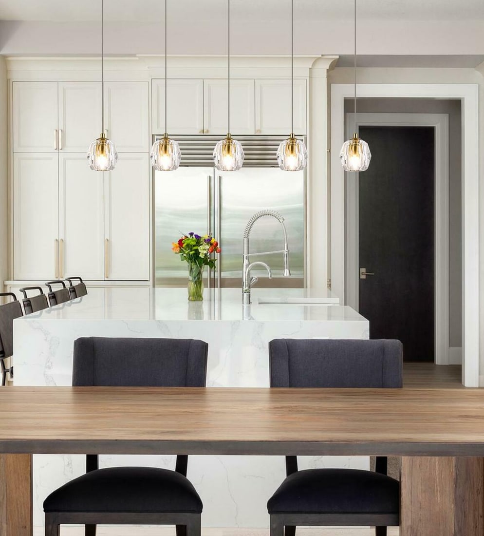 Gold Crystal 5-Light Eren Pendant Chandelier Adjustable Height: Gold Crystal 5-Light Eren Pendant Chandelier Adjustable Height This modern pendant chandelier features five lights with gold and iron construction, complemented by clear crystal shades. Designed for v