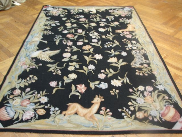 5' x 8' Black Wool Needlepoint Rug with Deer Design: 5' x 8' Black Wool Needlepoint Rug with Deer Design Free continental US Shipping Discover the exquisite 5' x 8' Black Needlepoint Rug, featuring a captivating deer and animal design. This unique area 