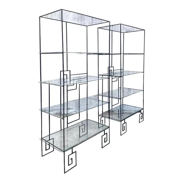 Pair of Wrought Iron Boho Art Deco Display Etageres With Glass Shelves: Pair of Wrought Iron Boho Art Deco Display Etageres With Glass Shelves This pair of vintage etageres combines Boho Chic flair with Art Deco geometric design. Each display shelf is crafted from dark wr