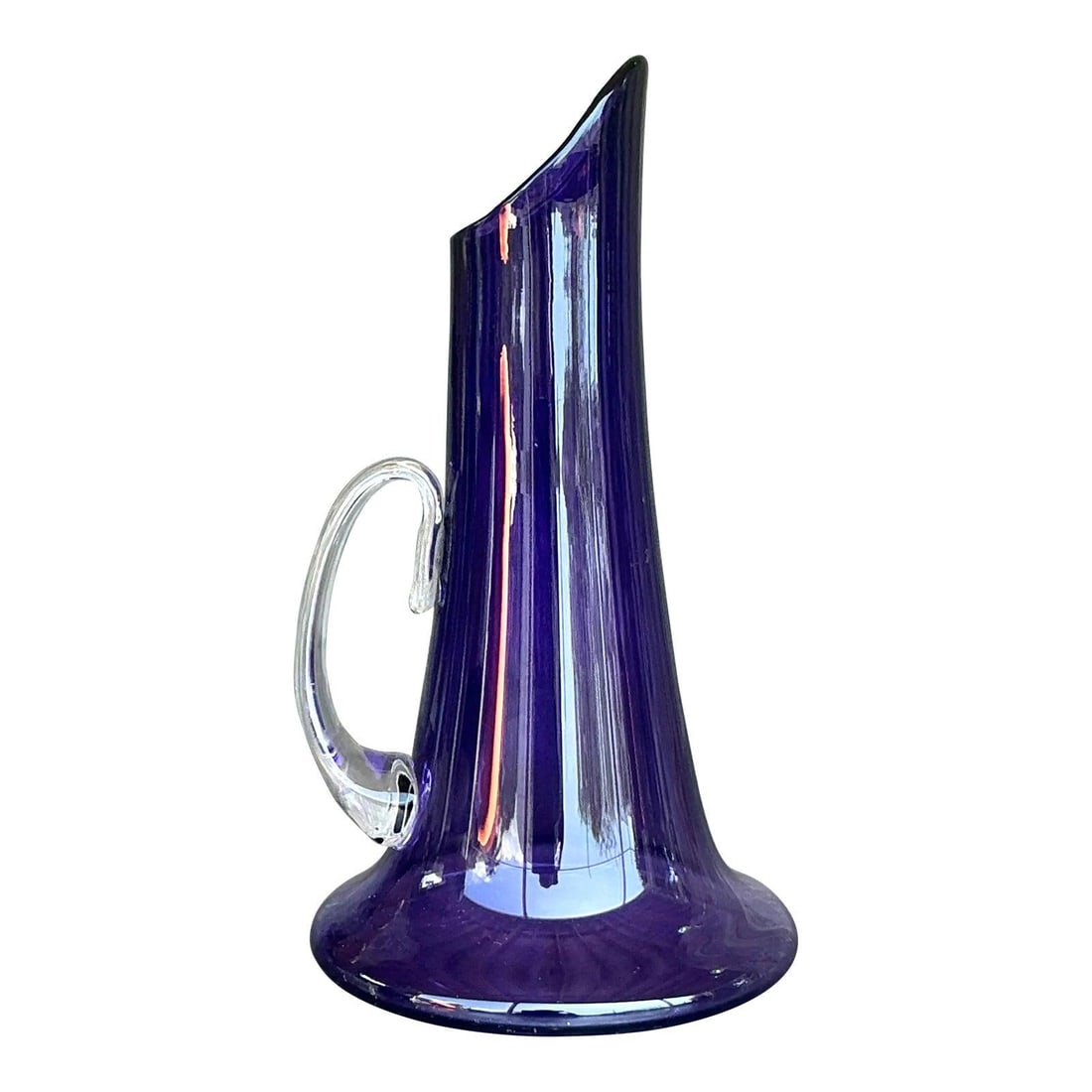 Unique Vintage Boho Art Glass Pitcher in Amethyst: Unique Vintage Boho Art Glass Pitcher in Amethyst Add a touch of artistic flair to your home with this Vintage Boho Art Glass Pitcher. This sculptural piece features a stunning amethyst hue complement