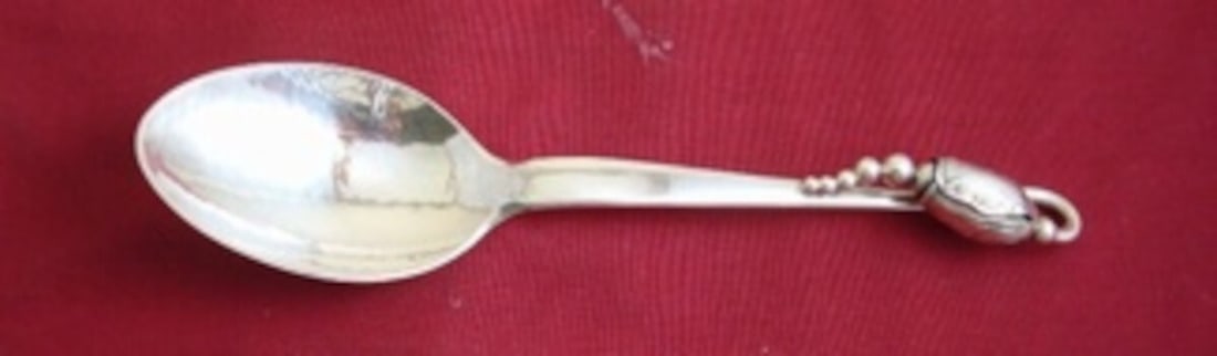 Georg Jensen Blossom Sterling Silver Dessert Spoon 6 7/8" Art Nouveau Design: Georg Jensen Blossom Sterling Silver Dessert Spoon 6 7/8" Art Nouveau Design Elevate your dining experience with the Blossom Sterling Silver Dessert Spoon by Georg Jensen, measuring 6 7/8". This exqui
