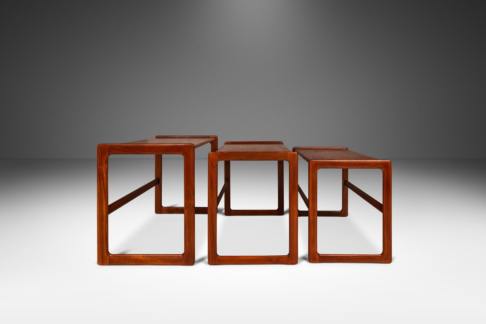 Arne Hovmand-Olsen Teak Nesting Tables Set of Three Danish Modern 1960s: Arne Hovmand-Olsen Teak Nesting Tables Set of Three Danish Modern 1960s Discover this exceptional set of three Danish Modern nesting tables designed by renowned furniture designer Arne Hovmand-Olsen f