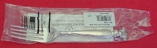 Wallace Romance of the Sea Sterling Silver Fork 7 3/8" New: Wallace Romance of the Sea Sterling Silver Fork 7 3/8" New This exquisite regular fork, measuring 7 3/8 inches, features the enchanting "Romance of the Sea" pattern by Wallace. Crafted from high-quali