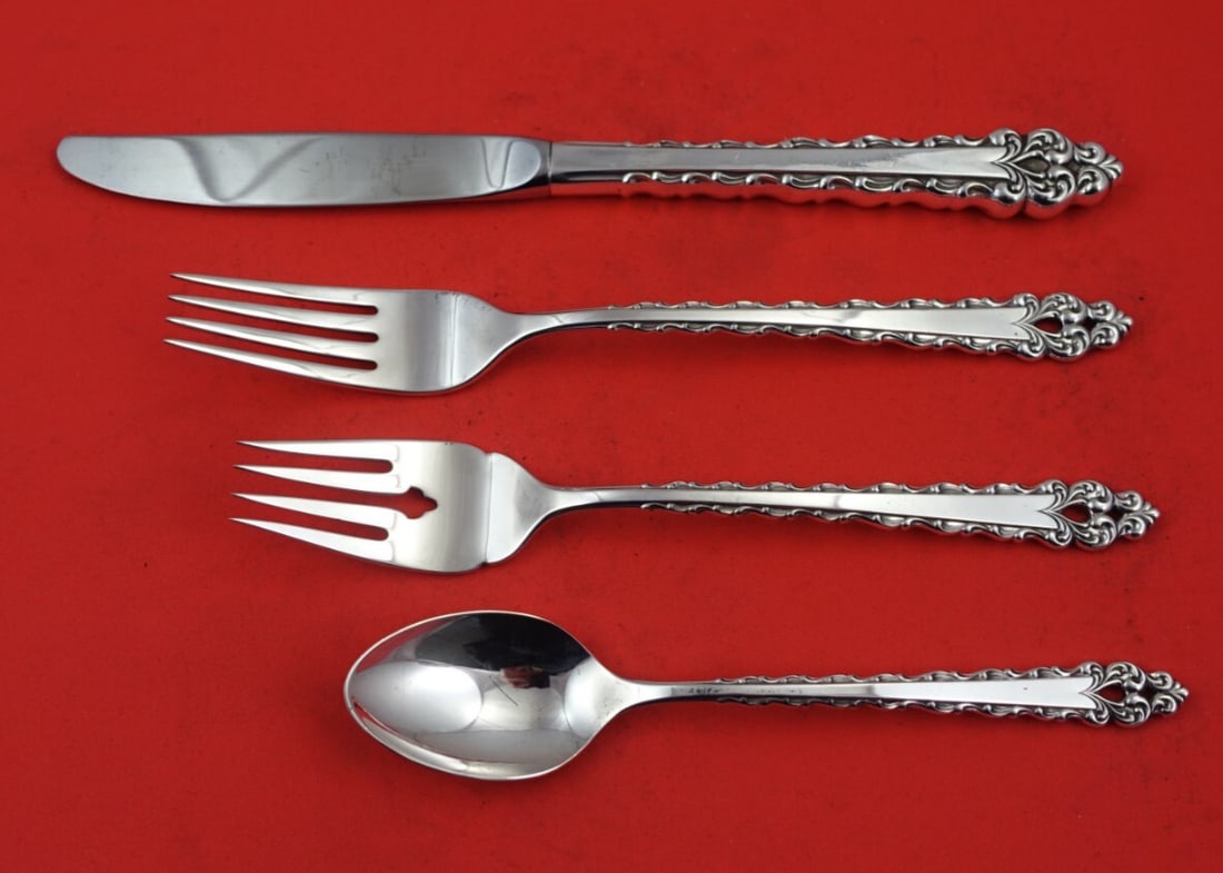 International Sterling Silver La Strada 4-Piece Place Setting: International Sterling Silver La Strada 4-Piece Place Setting Enhance your dining experience with the elegant La Strada flatware set by International Sterling. This 4-piece place setting features exqu