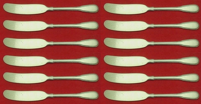 Tiffany & Co Hamilton Sterling Silver Butter Spreader Set 12 pc: Tiffany & Co Hamilton Sterling Silver Butter Spreader Set 12 pc This elegant 12-piece butter spreader set from Tiffany & Co. features the timeless Hamilton pattern, also known as Gramercy. Each spread