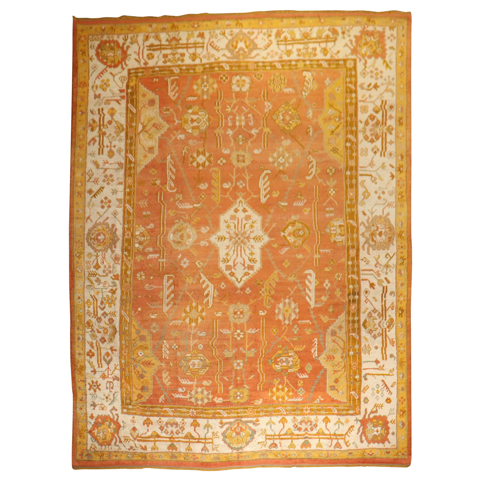 Antique Oushak Rug Early 20th Century Orange Wool Hand-Woven 10'4 x 13'2: Antique Oushak Rug Early 20th Century Orange Wool Hand-Woven 10'4 x 13'2 Discover the beauty of this early 20th-century antique Oushak rug, featuring a vibrant orange field that adds warmth to any spa