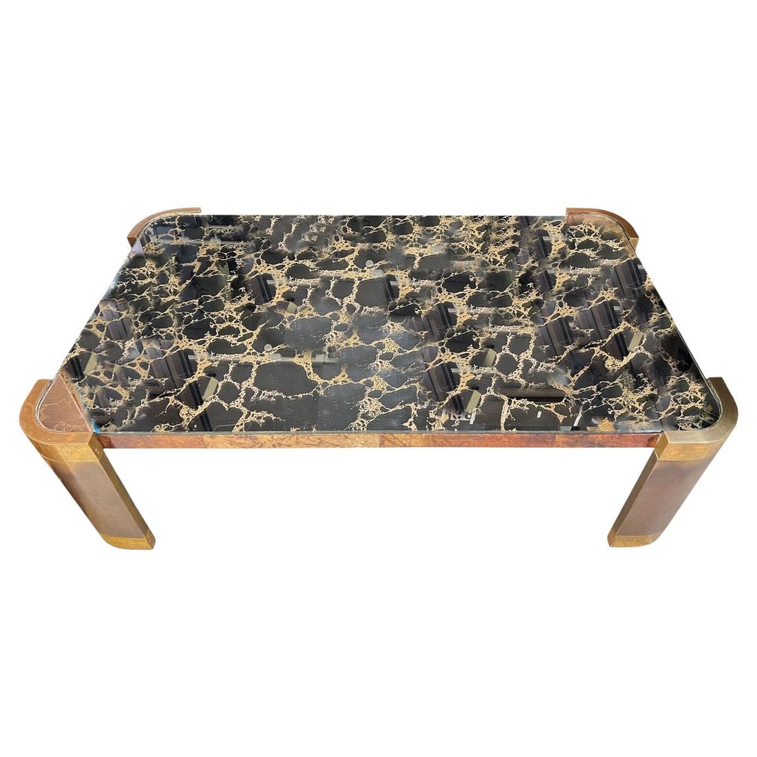 Bronze Framed Coffee Table With Glass Top and Lacquered Goatskin Frieze: Bronze Framed Coffee Table With Glass Top and Lacquered Goatskin Frieze This large mid-century modern coffee table, attributed to Karl Springer and dating to the 1970s, features a bronze frame, a glas