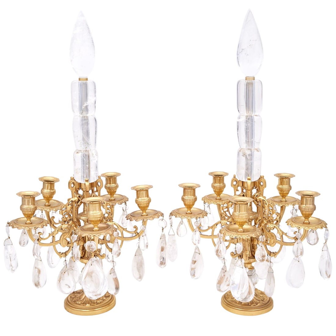 Set of Two Gilt Bronze and Rock Crystal Candelabra in Louis XVI Style: Set of Two Gilt Bronze and Rock Crystal Candelabra in Louis XVI Style This elegant pair of Louis XVI style candelabra features five lights on each piece, crafted from gilt bronze and adorned with rock