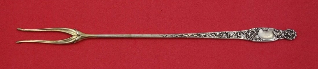 Whiting Heraldic Sterling Silver 2-Tine Pickle Fork 8 3/4 in: Whiting Heraldic Sterling Silver 2-Tine Pickle Fork 8 3/4 in This elegant 2-tine pickle fork from the Heraldic pattern by Whiting is crafted from high-quality sterling silver. Measuring 8 3/4 inches, 