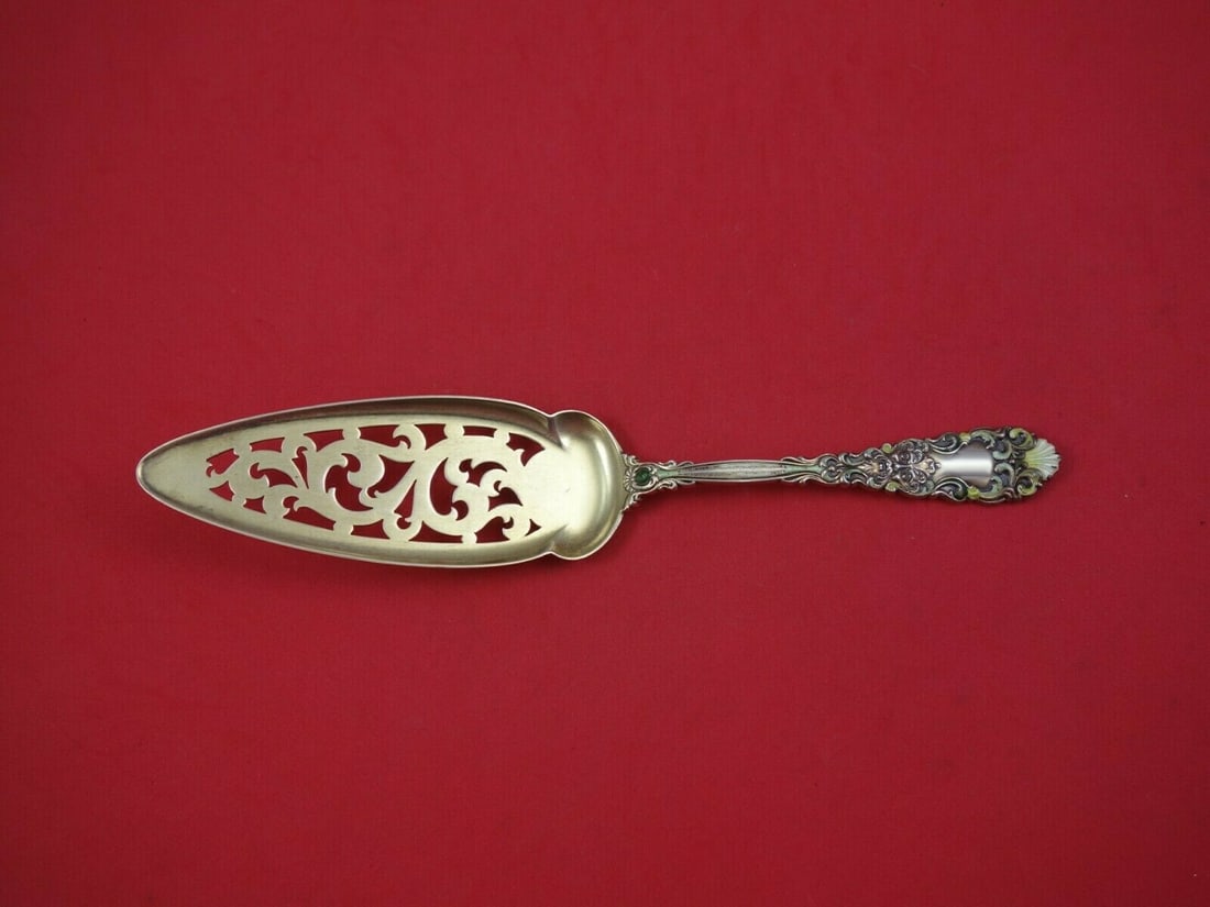 Dominick & Haff Renaissance Sterling Silver Jelly Cake Server 9 7/8": Dominick & Haff Renaissance Sterling Silver Jelly Cake Server 9 7/8" This exquisite Renaissance jelly cake server, crafted by Dominick & Haff, showcases the elegance of sterling silver with a gold was