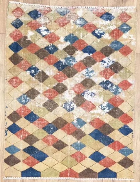 Handmade Wool Geometric Tribal Area Rug 2'1 x 3'2: Handmade Wool Geometric Tribal Area Rug 2'1 x 3'2 This semi-antique Oriental rug features a distressed geometric pattern and is hand-knotted from wool. Measuring approximately 2'1" x 3'2", it offers a