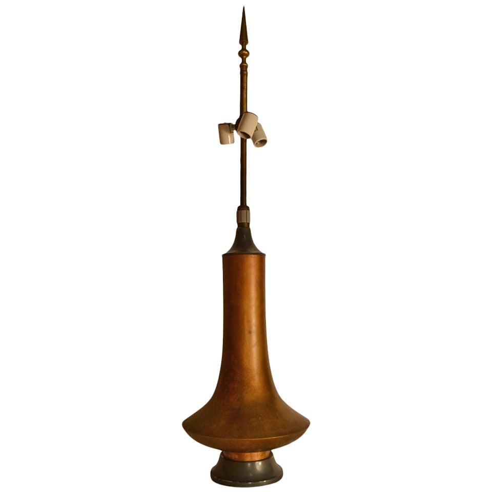 Damon Gaffard Hansen Lighting Copper Patinated Table Lamp: Damon Gaffard Hansen Lighting Copper Patinated Table Lamp This stunning table lamp by Damon Gaffard for Hansen Lighting Company showcases a unique copper patinated vessel form body, elegantly mounted 