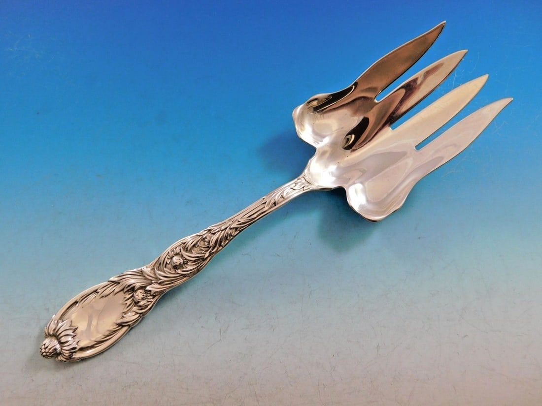 Sterling Silver Fish Serving Fork Chrysanthemum Pattern 9 5/8 Inch: Sterling Silver Fish Serving Fork Chrysanthemum Pattern 9 5/8 Inch This sterling silver fish serving fork is crafted in the Chrysanthemum pattern by Tiffany & Co., designed circa 1880 by Charles Grosj