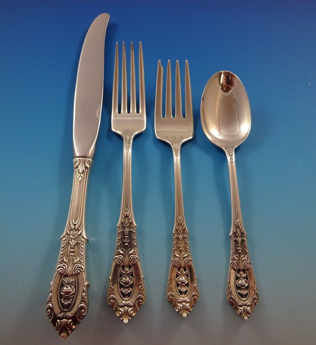 Wallace Rose Point Sterling Silver 4-Piece Place Setting: Wallace Rose Point Sterling Silver 4-Piece Place Setting Enhance your dining experience with this exquisite 4-piece place setting from the Rose Point collection by Wallace. Crafted from high-quality s