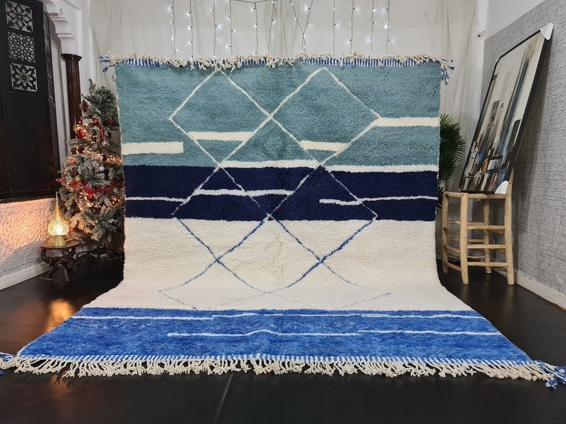 Authentic Moroccan Berber Handmade Wool Rug 9.84 x 6.56 Feet: Authentic Moroccan Berber Handmade Wool Rug 9.84 x 6.56 Feet Experience the luxury of this stunning Moroccan Berber handmade wool rug. This exquisite piece features a captivating geometric pattern div