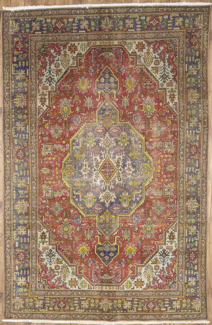 Hand Knotted Wool Floral Area Rug 6'6 x 9'11 Muted Colors: Hand Knotted Wool Floral Area Rug 6'6 x 9'11 Muted Colors This semi-antique Oriental area rug features a hand-knotted wool construction with a vintage floral pattern in muted tones of red, plum, cream