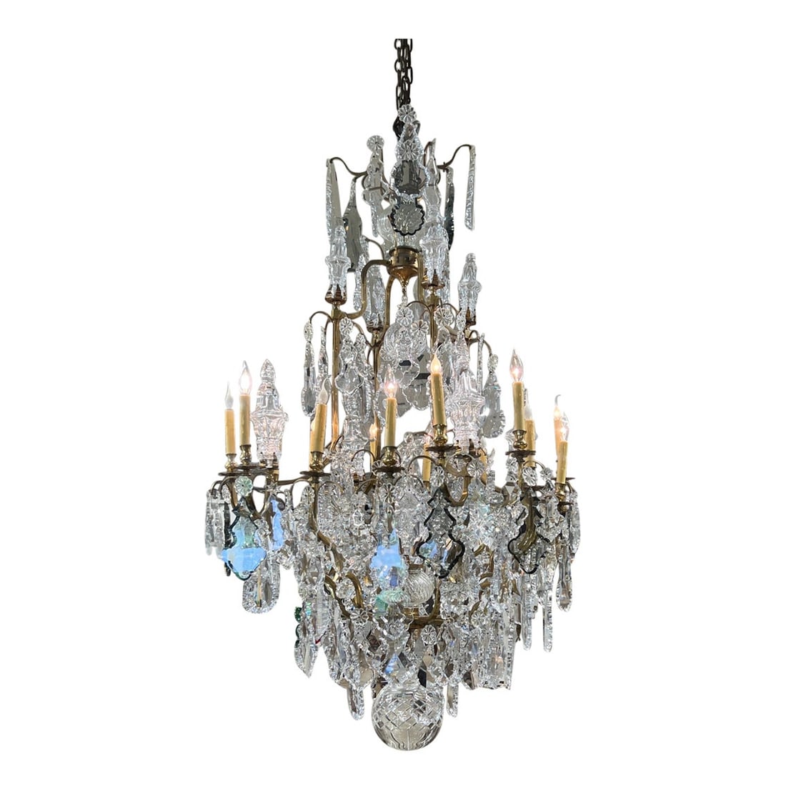 19th Century French Louis XV Gilt Bronze Crystal Chandelier 16-Light: 19th Century French Louis XV Gilt Bronze Crystal Chandelier 16-Light This stunning 19th Century French Louis XV chandelier is a remarkable piece that exemplifies the grandeur of its era. Measuring 66 