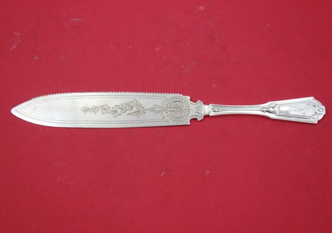 Whiting Sterling Silver Keystone Cake Knife Brite-Cut 9.5 Inch: Whiting Sterling Silver Keystone Cake Knife Brite-Cut 9.5 Inch This elegant Keystone by Whiting cake knife is a fine example of 19th-century craftsmanship. Crafted from sterling silver, this knife fea