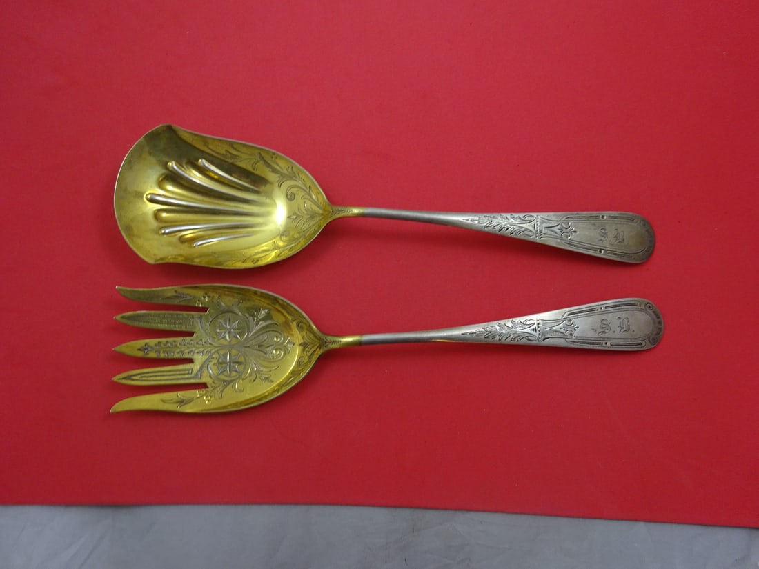 Kirder & Biddle Sterling Silver Goldwashed Salad Serving Set 2-Piece: Kirder & Biddle Sterling Silver Goldwashed Salad Serving Set 2-Piece Discover the elegance of this Sterling Silver Salad Serving Set by Kirder & Biddle, featuring a beautiful goldwash finish with a br