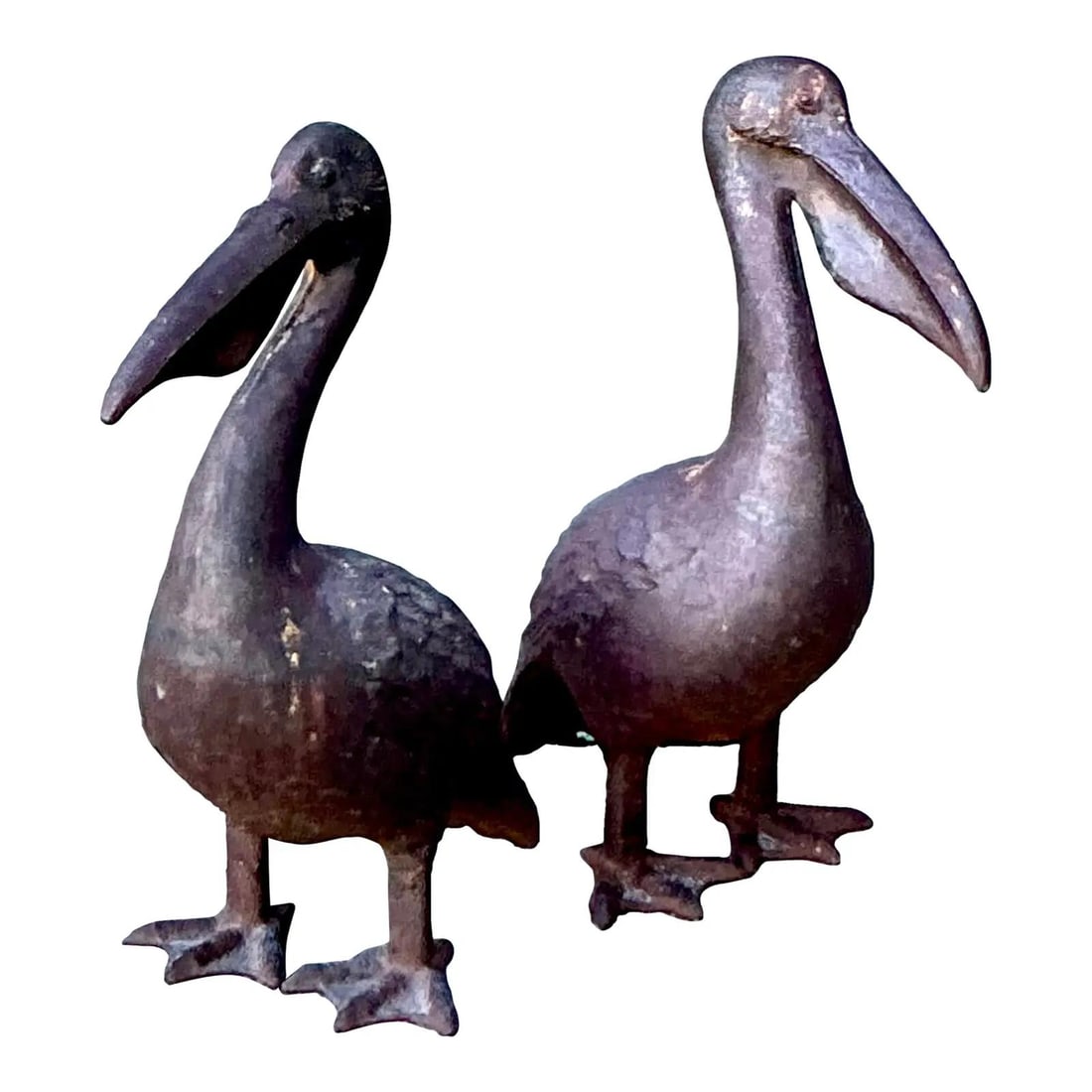 Pair of Patinated Wrought Iron Pelican Sculptures Coastal Mid Century Style Set of 2: Pair of Patinated Wrought Iron Pelican Sculptures Coastal Mid Century Style Set of 2 This set includes two vintage pelican statues crafted from wrought iron, each featuring a hand-applied weathered pa