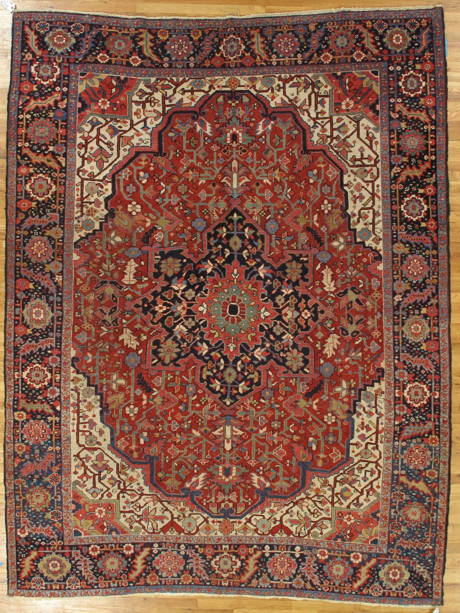 Handcrafted Persian Heriz Rug 8'4 x 11' Traditional Design: Handcrafted Persian Heriz Rug 8'4 x 11' Traditional Design Free continental US Shipping Enhance your space with this exquisite handcrafted Red Antique Persian Heriz Rug, measuring 8' 4" x 11'. Created