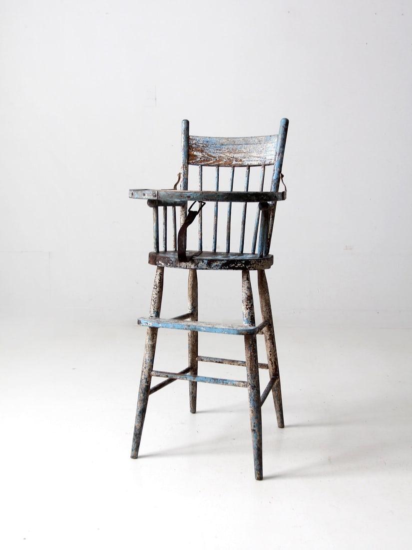 Antique Decorative Wooden Children's Chair with Swing Tray: Antique Decorative Wooden Children's Chair with Swing Tray This antique children's chair is a stunning decorative piece, crafted from wood and featuring an intricately painted design in naturally aged