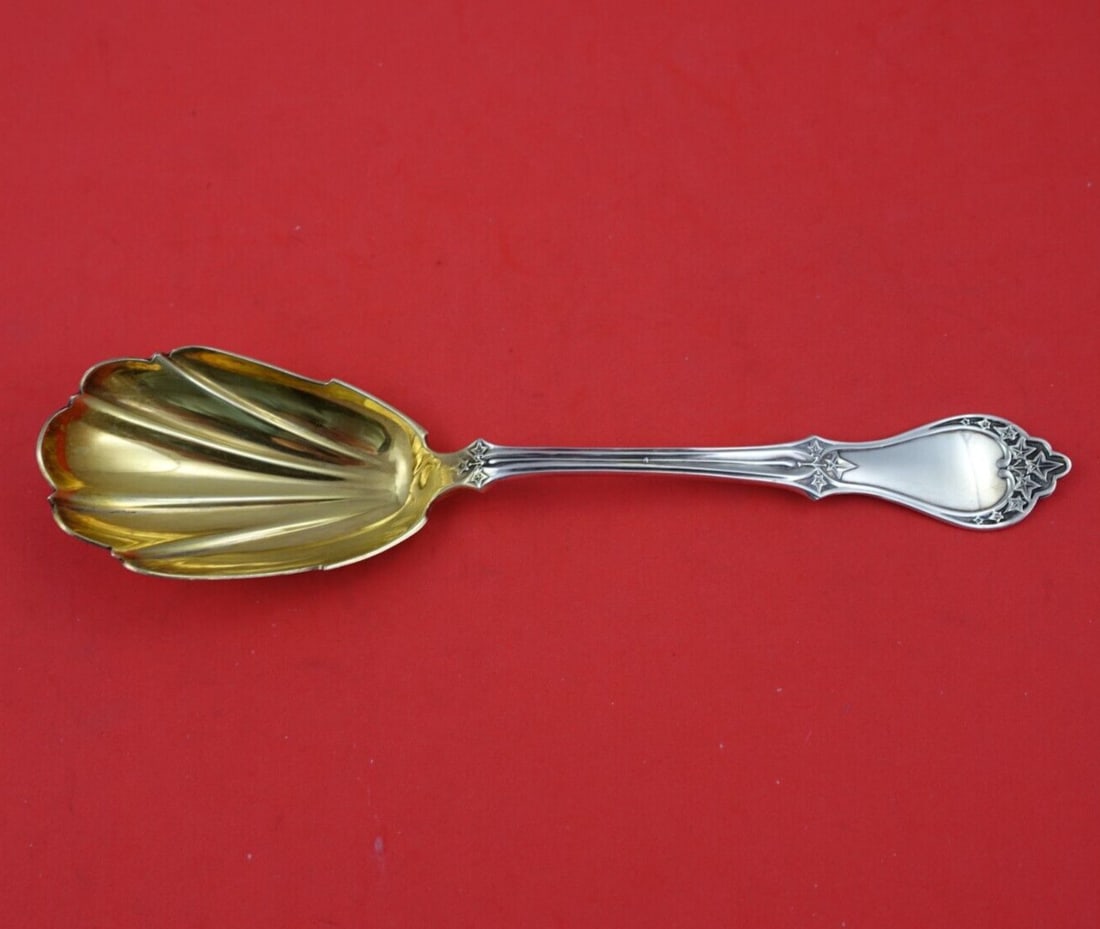 John L. Westervelt Ivy Sterling Silver Serving Spoon Gold Washed 8 1/4": John L. Westervelt Ivy Sterling Silver Serving Spoon Gold Washed 8 1/4" Introducing the Ivy Serving Spoon by John L. Westervelt, a stunning piece crafted from high-quality sterling silver (.925) with 