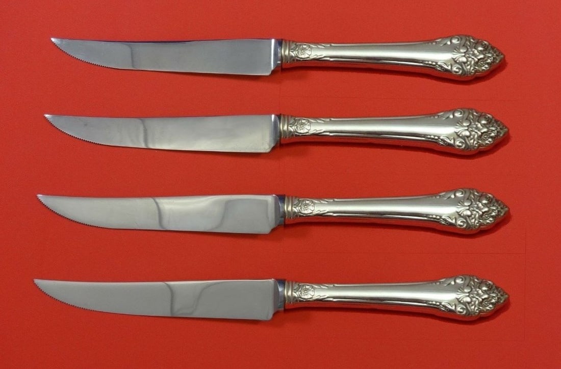 Reed & Barton Fragrance Sterling Silver Steak Knife Set 4pc Custom: Reed & Barton Fragrance Sterling Silver Steak Knife Set 4pc Custom Enhance your dining experience with this exquisite 4-piece steak knife set by Reed & Barton, featuring the elegant Fragrance pattern.