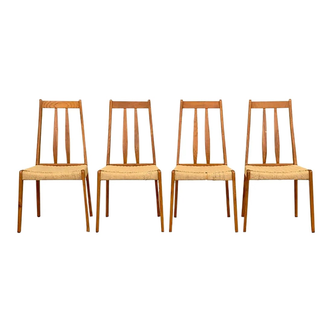 Set of Four Mid Century Danish Teak Dining Chairs With Paper Cord Seats: Set of Four Mid Century Danish Teak Dining Chairs With Paper Cord Seats This set includes four Danish modern dining chairs from the 1960s, crafted from teak with paper cord seats. The chairs feature a