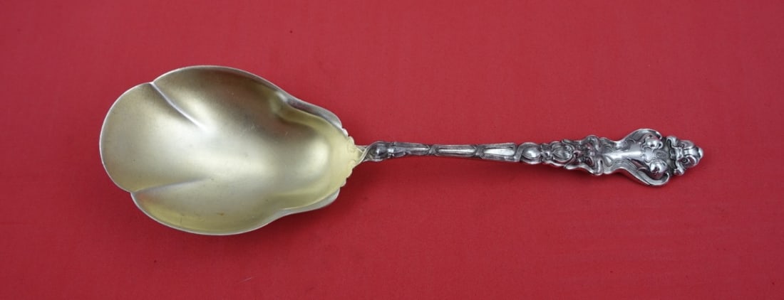 Unger Douvaine Sterling Silver Gold Wash Serving Spoon 9 1/4": Unger Douvaine Sterling Silver Gold Wash Serving Spoon 9 1/4" This exquisite Douvaine vegetable serving spoon by Unger is crafted from high-quality sterling silver, featuring a beautiful gold wash fin