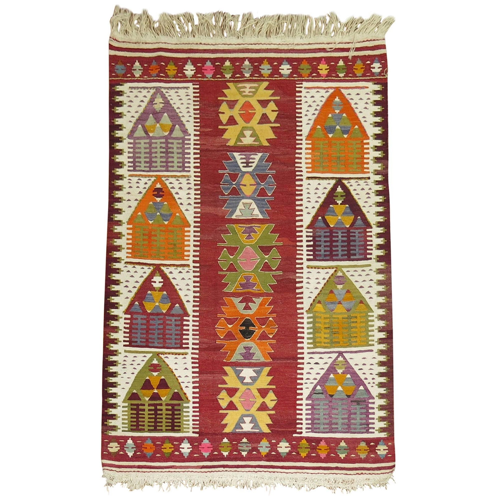 Mid 20th Century Turkish Wool Hand Knotted Kilim 51 x 73 in: Mid 20th Century Turkish Wool Hand Knotted Kilim 51 x 73 in This vintage Turkish Kilim features a flat-weave construction with a directional motif depicting small homes, characteristic of Prairie Scho