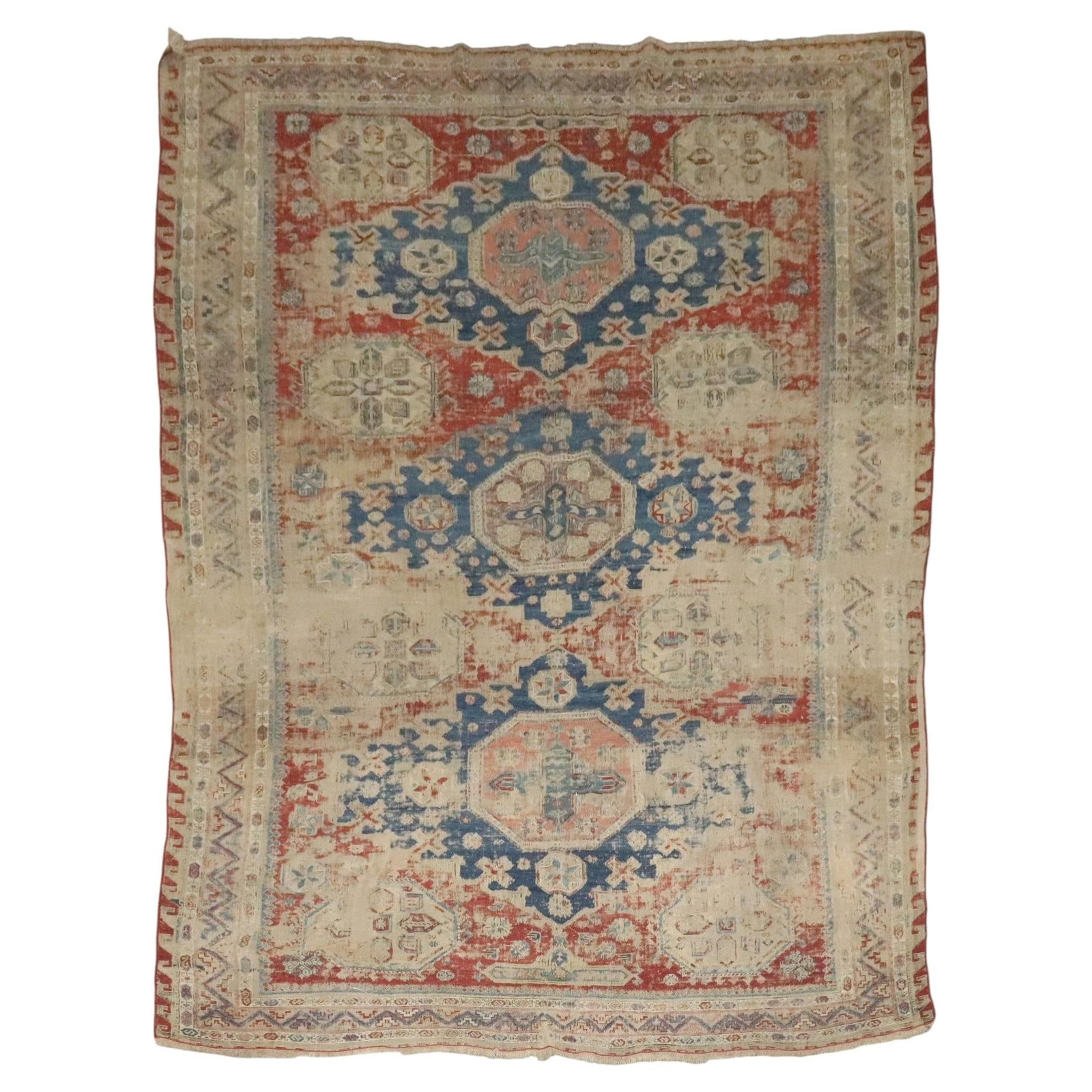 Late 19th Century Uzbek Wool Soumac Tribal Rug: Late 19th Century Uzbek Wool Soumac Tribal Rug This antique Soumac rug from the late 19th century features a tribal design and was hand-woven in Uzbekistan using wool. Its worn appearance adds charact