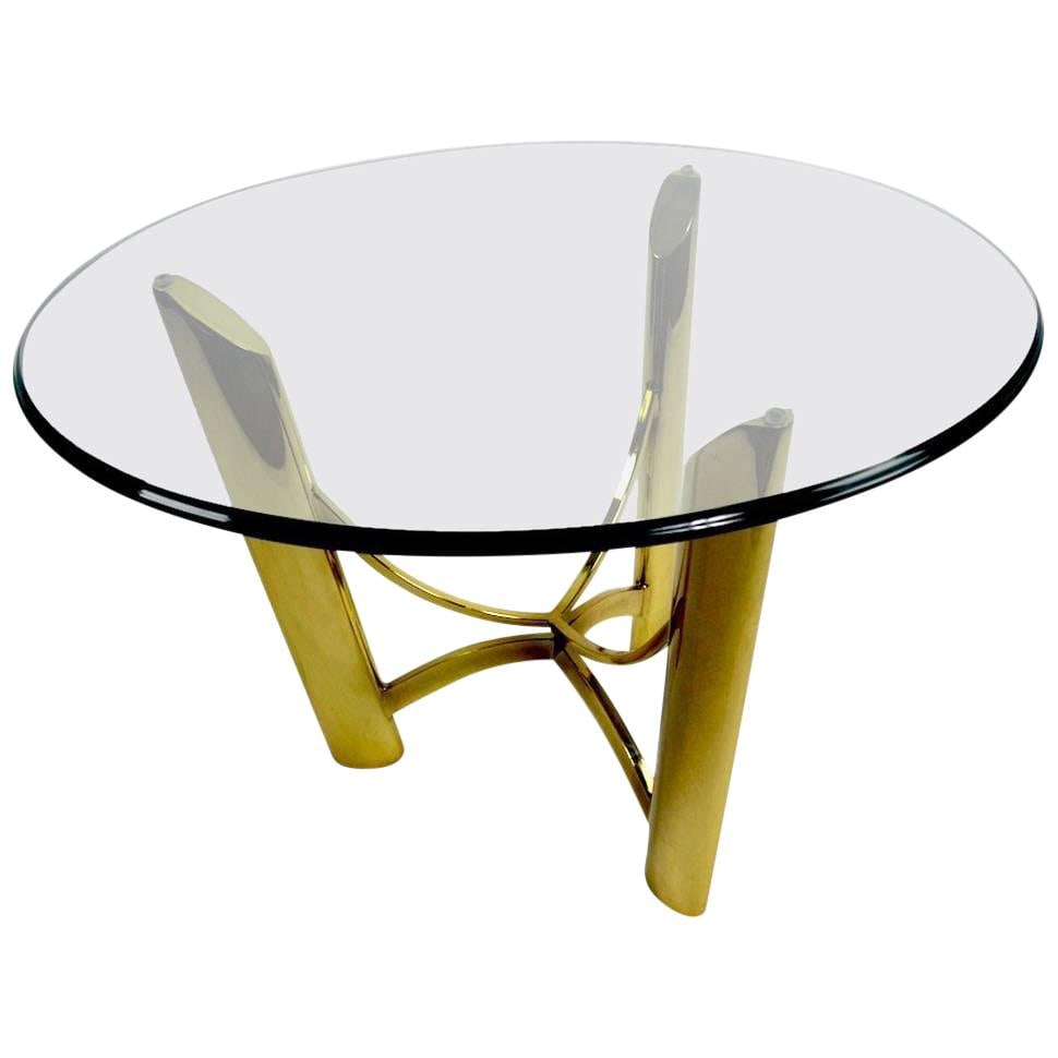 Mastercraft Brass Base Glass Top Side Table Gold Finish: Mastercraft Brass Base Glass Top Side Table Gold Finish This elegant modernist table features a striking brass base paired with a sleek plate glass top, attributed to Mastercraft. The design is both f