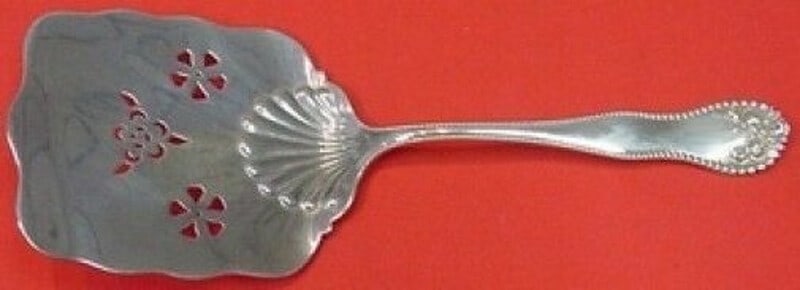 Gorham Lancaster Sterling Silver Waffle Server 8 1/8 Inch: Gorham Lancaster Sterling Silver Waffle Server 8 1/8 Inch This exquisite Lancaster Waffle Server by Gorham is crafted from high-quality sterling silver, showcasing the elegant Lancaster pattern. Measu