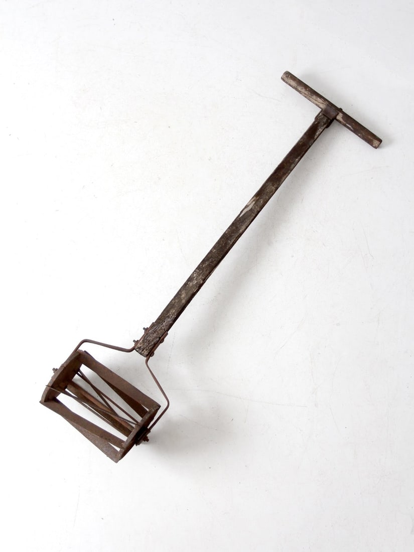Antique Push Reel Mower The Barker 1909 Patent Rustic Garden Decor: Antique Push Reel Mower The Barker 1909 Patent Rustic Garden Decor This antique push reel mower is a captivating piece of early 20th-century history, featuring weathered wood and metal components. Mar