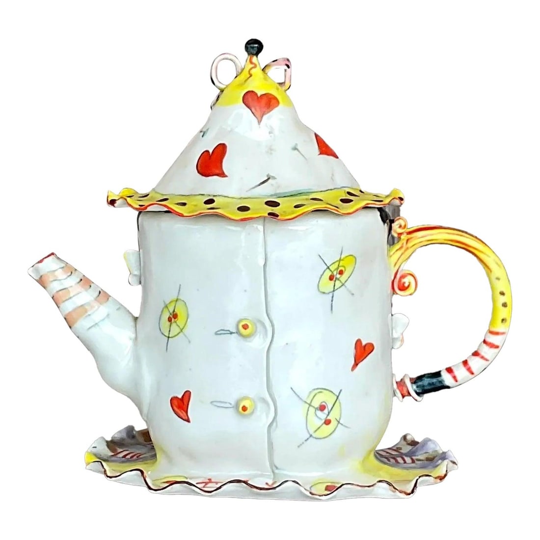 Ceramic Teapot with Multicolor Face Motif Vintage Design: Ceramic Teapot with Multicolor Face Motif Vintage Design This vintage teapot features a colorful, hand-painted design on a ceramic surface, creating a unique and eye-catching piece. Acquired from a Pa