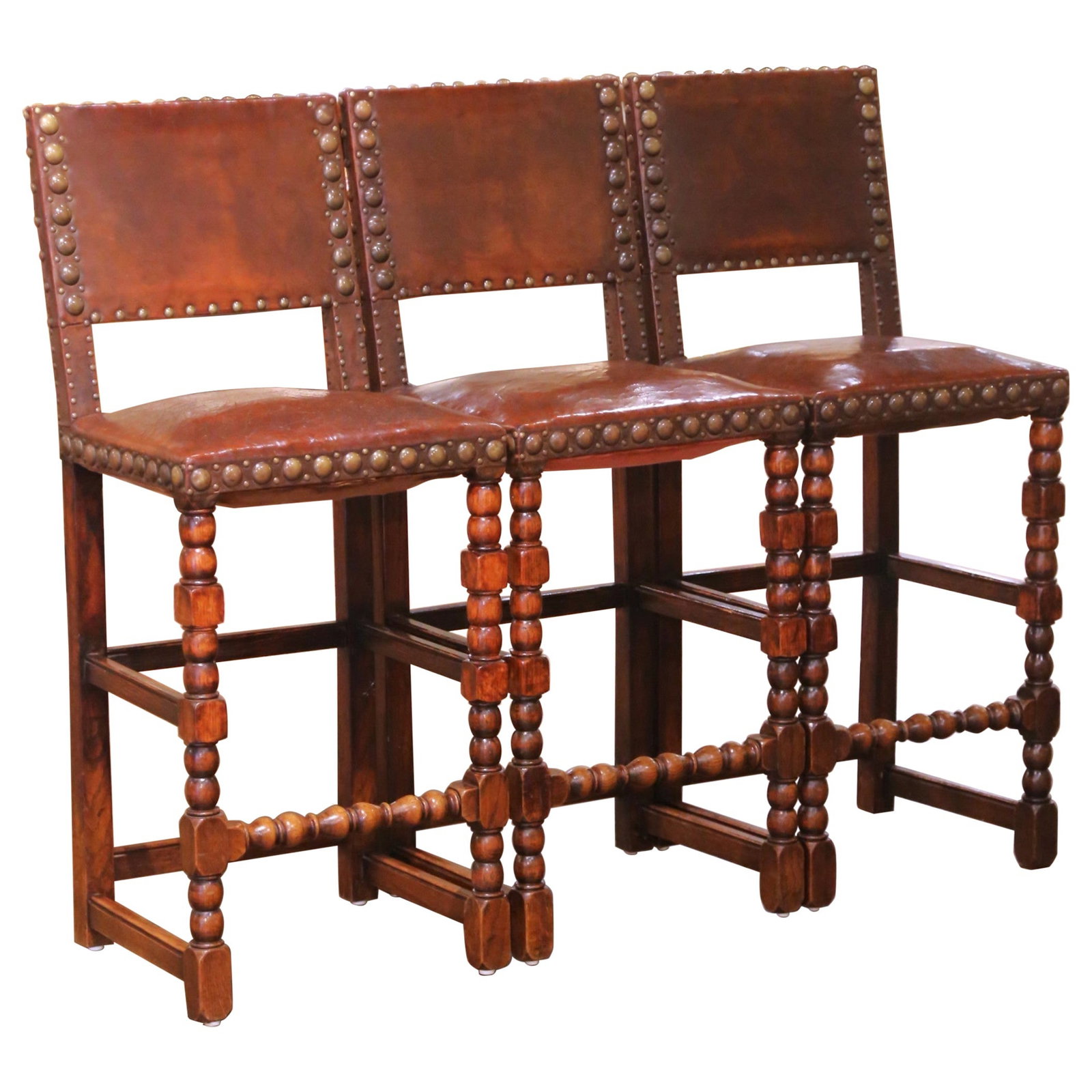 Three Antique French Oak and Leather Gothic Revival Barstools Circa 1890: Three Antique French Oak and Leather Gothic Revival Barstools Circa 1890 This set of three late 19th century French bar stools showcases the Gothic Revival style with hand-carved solid oak frames and 