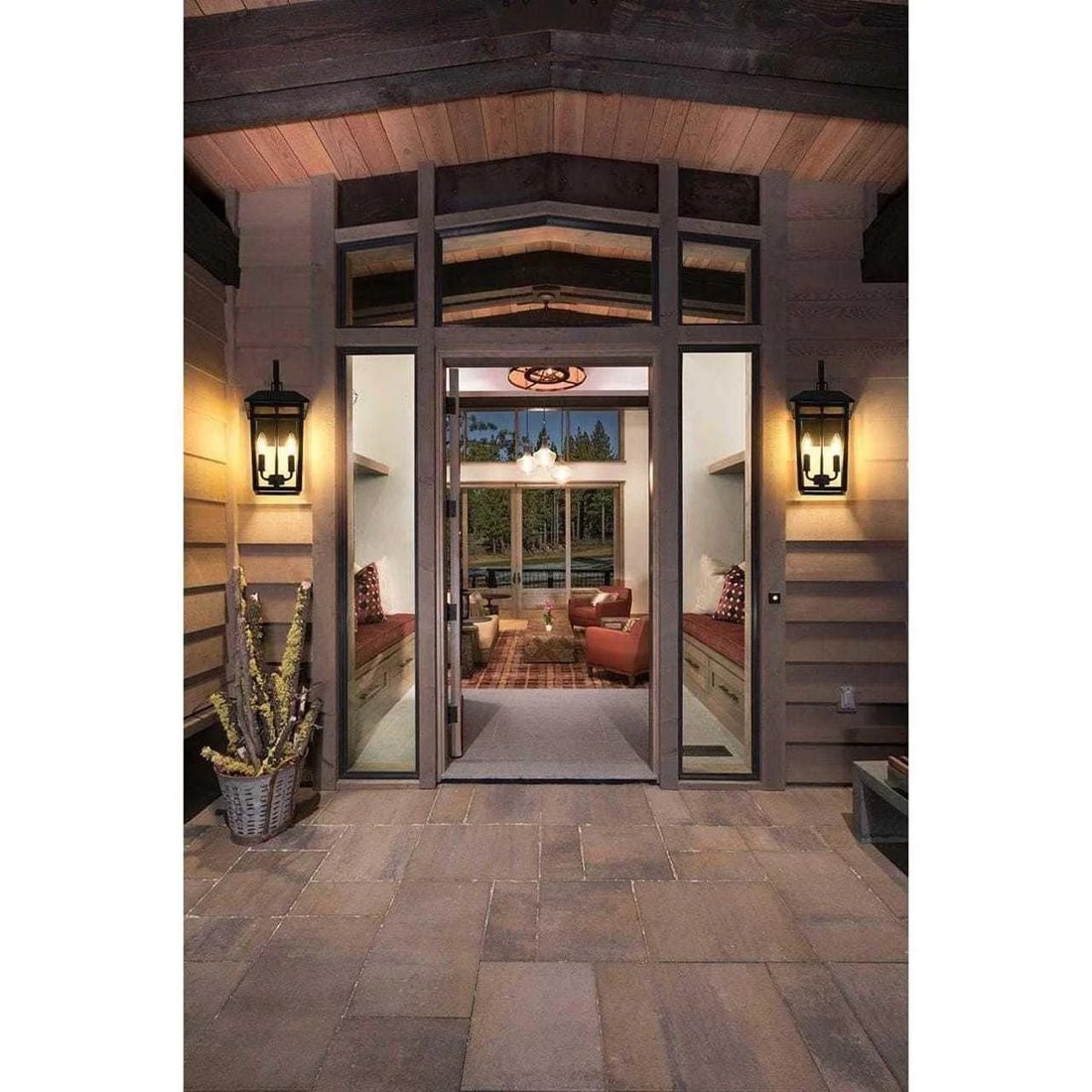 Riggs Black Iron Glass Outdoor Wall Light 2 Bulb 18.1 Inch: Riggs Black Iron Glass Outdoor Wall Light 2 Bulb 18.1 Inch This outdoor wall sconce features a traditional design with a black iron finish and clear glass panels. It is suitable for patios, porches, e
