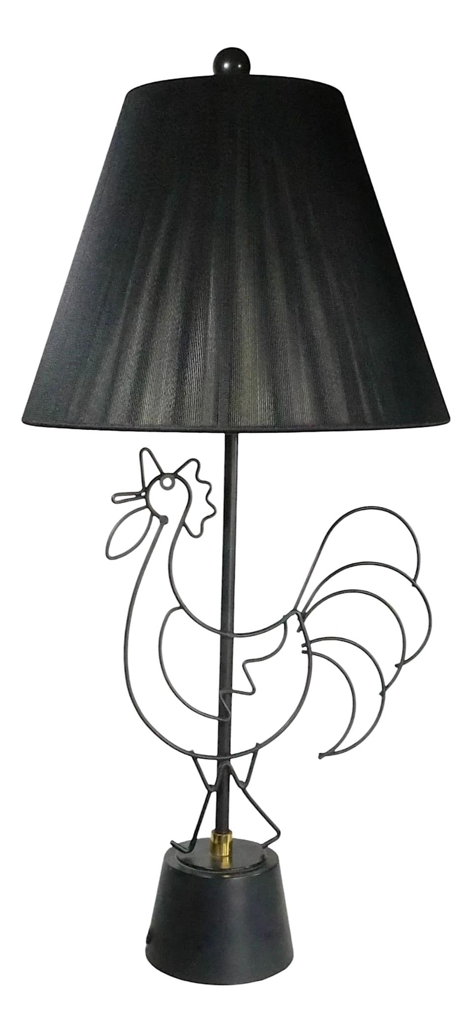 Mid Century Wire Rooster Table Lamp by Fredrick Weinberg Black Brass Wrought Iron: Mid Century Wire Rooster Table Lamp by Fredrick Weinberg Black Brass Wrought Iron This stunning Mid Century stylized wire rooster table lamp, attributed to Fredrick Weinberg, is a striking addition to
