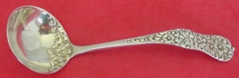 Dominick Haff Rococo Sterling Silver Gravy Ladle with Floral Bowl: Dominick Haff Rococo Sterling Silver Gravy Ladle with Floral Bowl This is a sterling silver gravy ladle in the Rococo pattern by Dominick & Haff, featuring ornate floral detailing in the bowl. The lad