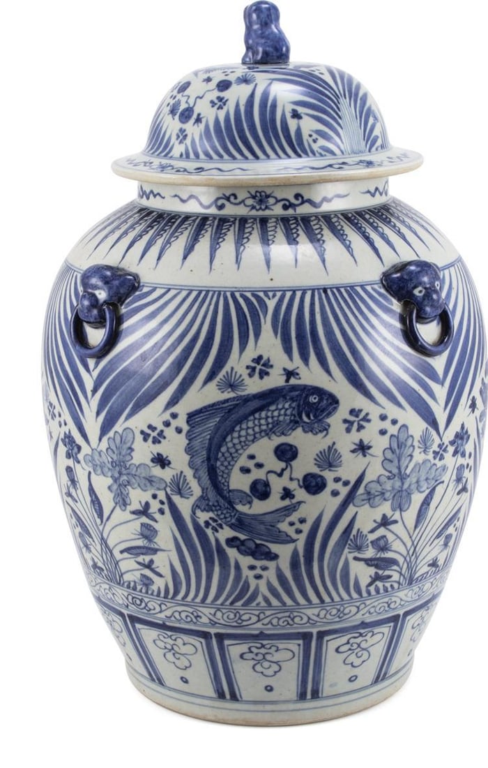 Hand-Crafted Blue Porcelain Jar with Fish Design and Foo Dog Handles: Hand-Crafted Blue Porcelain Jar with Fish Design and Foo Dog Handles This exquisite Blue & White Village Fish Porcelain Jar showcases a captivating Chinoiserie style, perfect for enhancing any decor. 