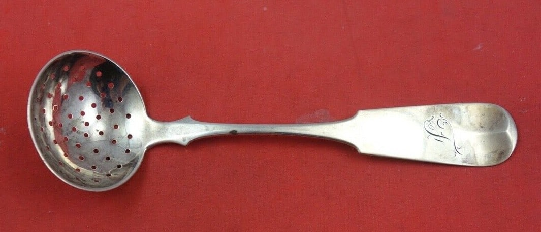 G.B. Foster Fiddle Pattern Sterling Silver Sugar Sifter 6.5": G.B. Foster Fiddle Pattern Sterling Silver Sugar Sifter 6.5" This exquisite coin silver sugar sifter features a classic Fiddle pattern and was crafted by G.B. Foster in Salem, Massachusetts, circa 182