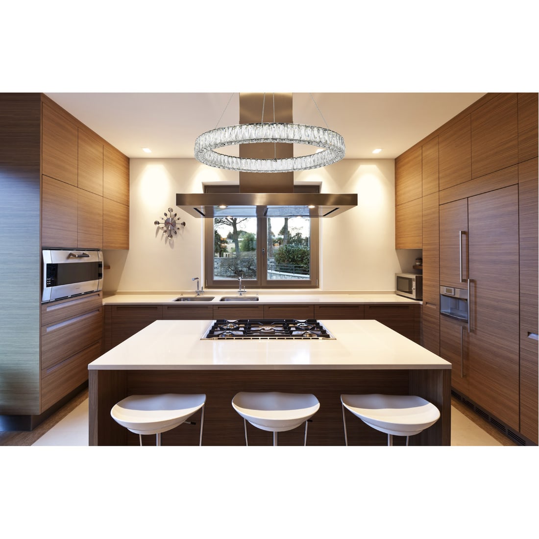 Monroe Crystal LED Chandelier Chrome 31.5 Inch Adjustable Height: Monroe Crystal LED Chandelier Chrome 31.5 Inch Adjustable Height This modern chandelier features a sleek halo design with high-quality chrome and royal cut clear crystals, making it an elegant additio