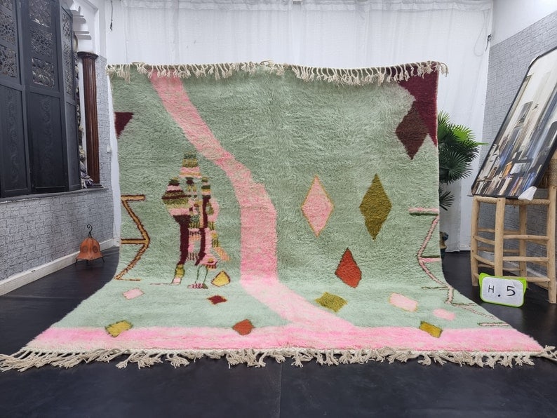 Authentic Moroccan Berber Wool Area Rug 9.84 x 8.20 Feet: Authentic Moroccan Berber Wool Area Rug 9.84 x 8.20 Feet Discover the charm of this Authentic Soft Handmade Moroccan Berber Wool Area Rug. Crafted by skilled local Berber women weavers in the Atlas Mo