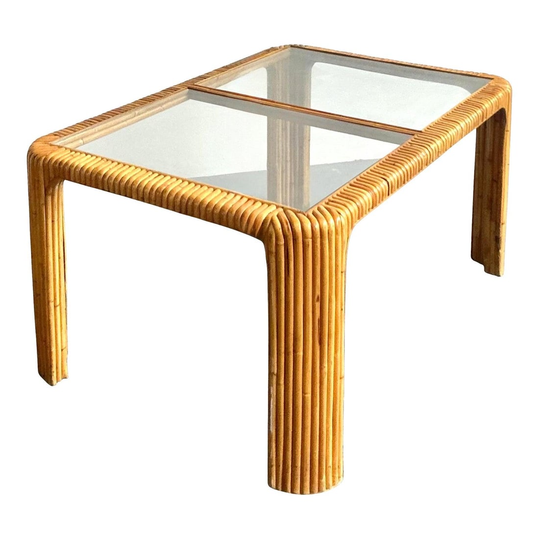1970s Waterfall Rattan Dining Table with Glass Top and Parquetry Detail: 1970s Waterfall Rattan Dining Table with Glass Top and Parquetry Detail This vintage bent rattan dining table reflects the organic elegance of 1970s Boho Chic design. Handcrafted from bundled "pencil 